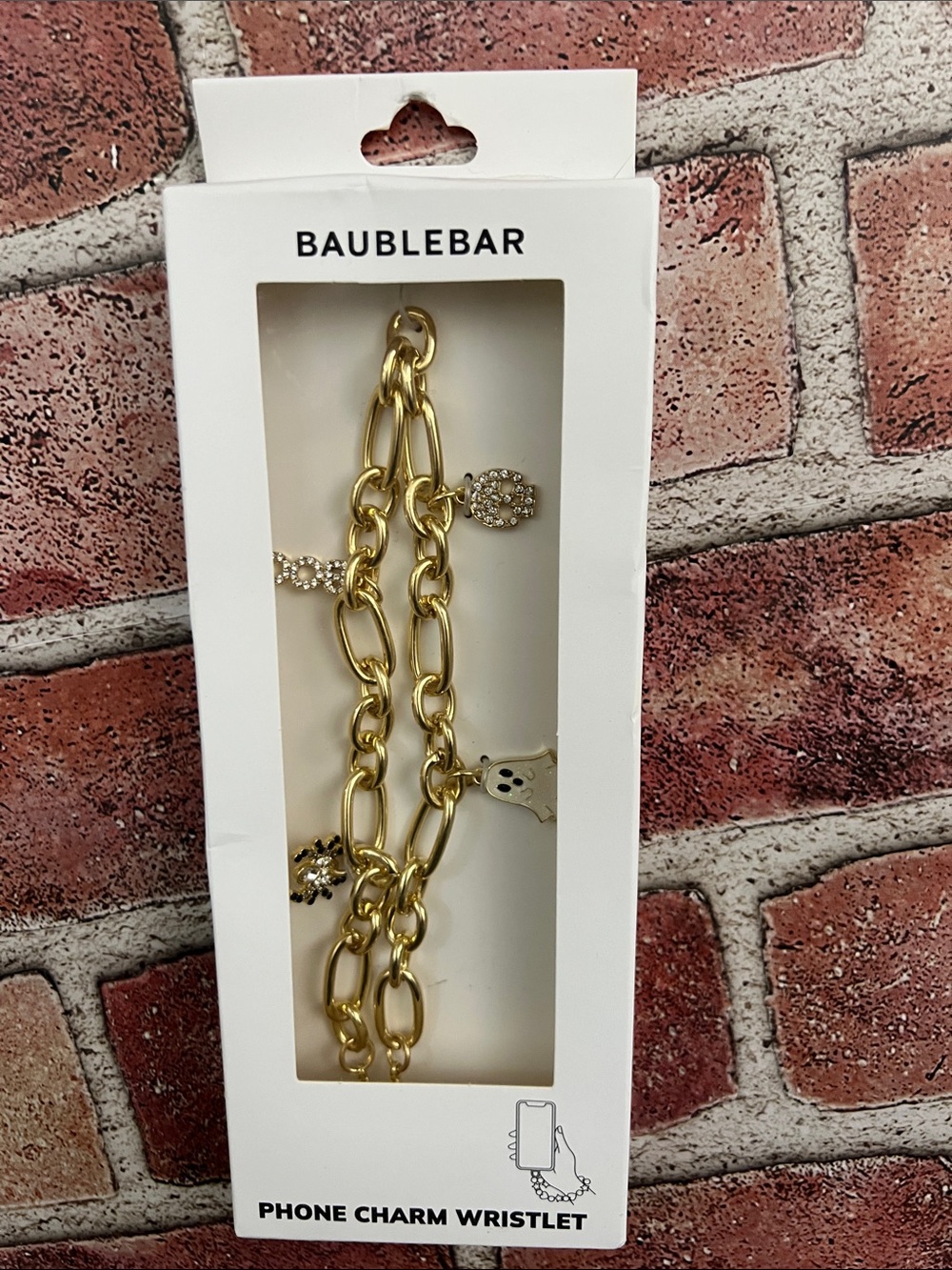 BaubleBar Halloween Gold Tone Charm Phone Wristlet with Rhinestone Accents